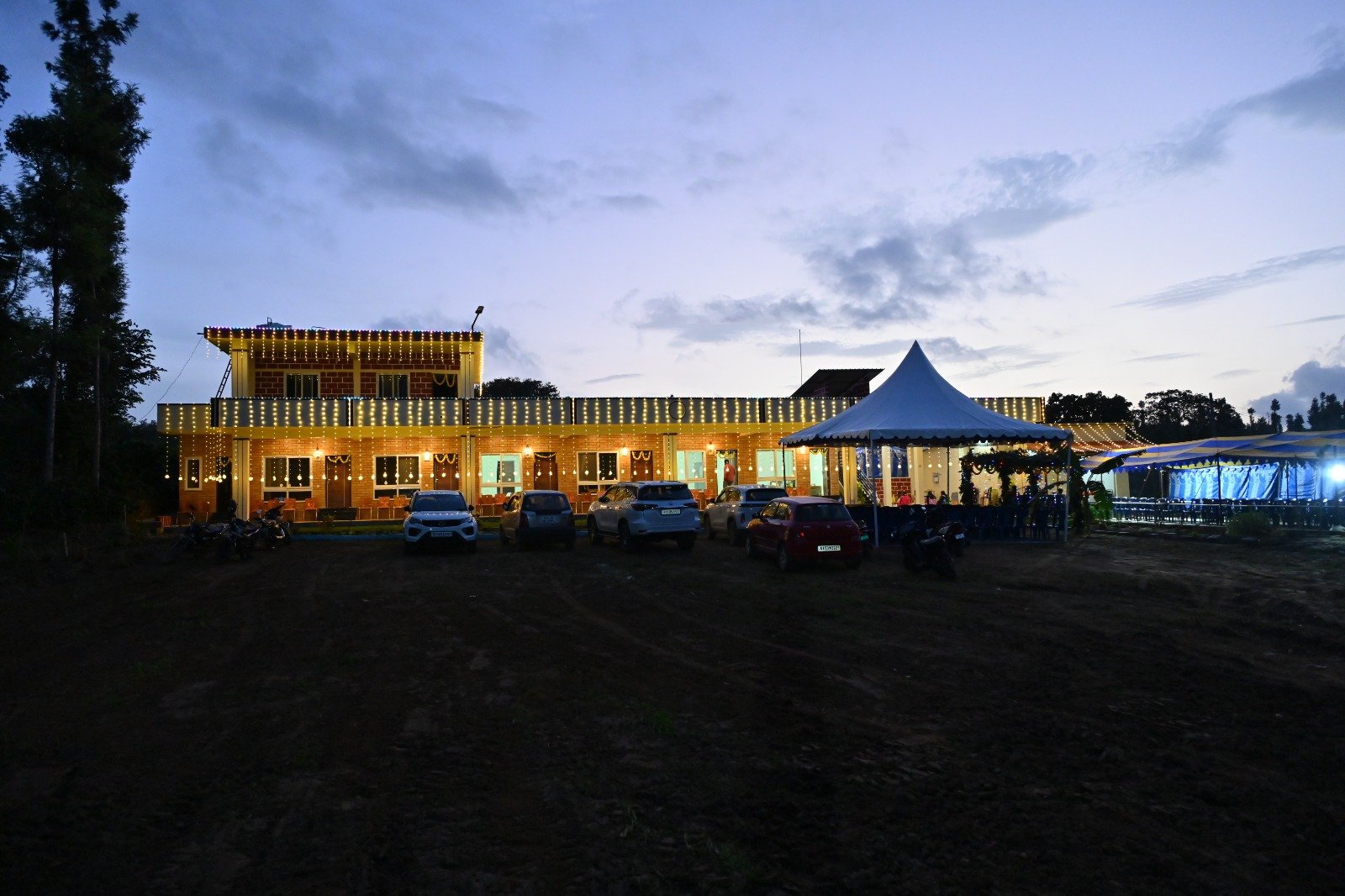 The homestay at dusk with ample parking